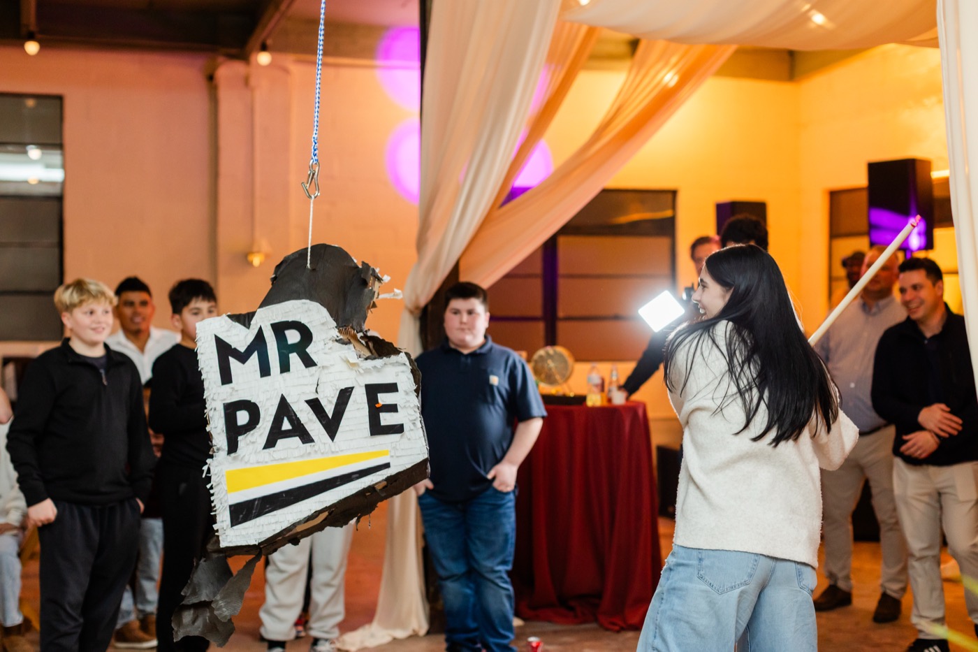 Mr. Pave team moment from a past company event